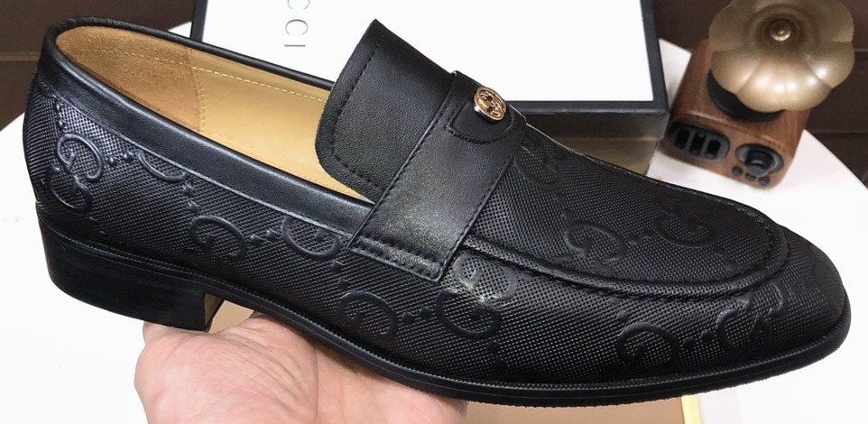 Gucci Black Embossed Leather Loafers — front
